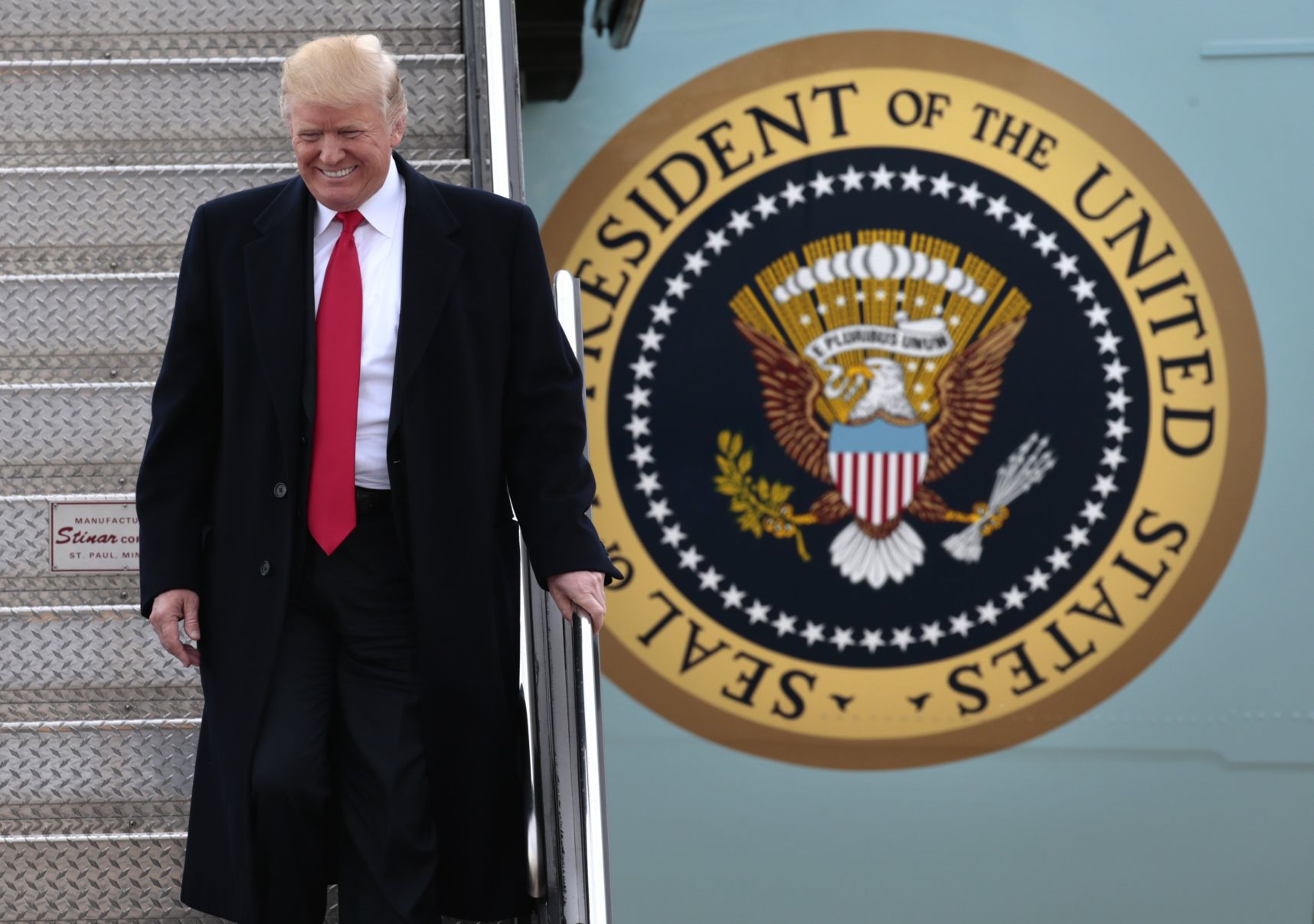 President Donald Trump arrives in St. Louis for tax speech
